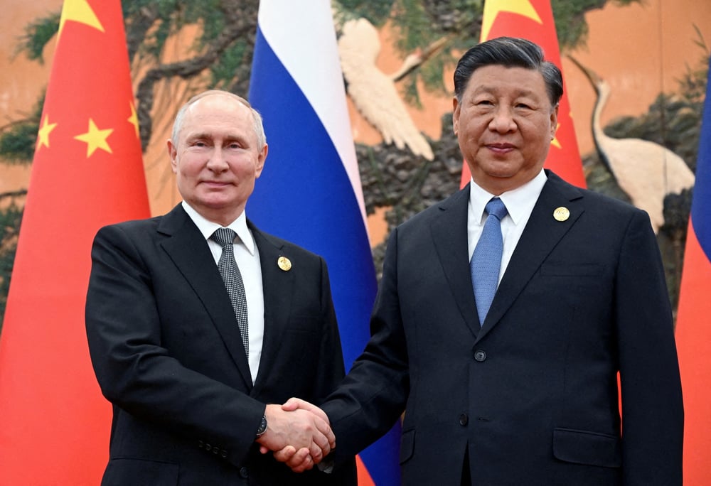 Le president russe vladimir poutine et le president chinois xi jinping