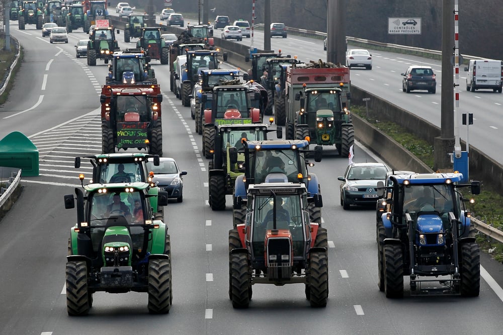 French farmers drive their tractors on the a7 highway to protest changes in underprivileged farm area’s mapping and against mercosur talks, in solaize