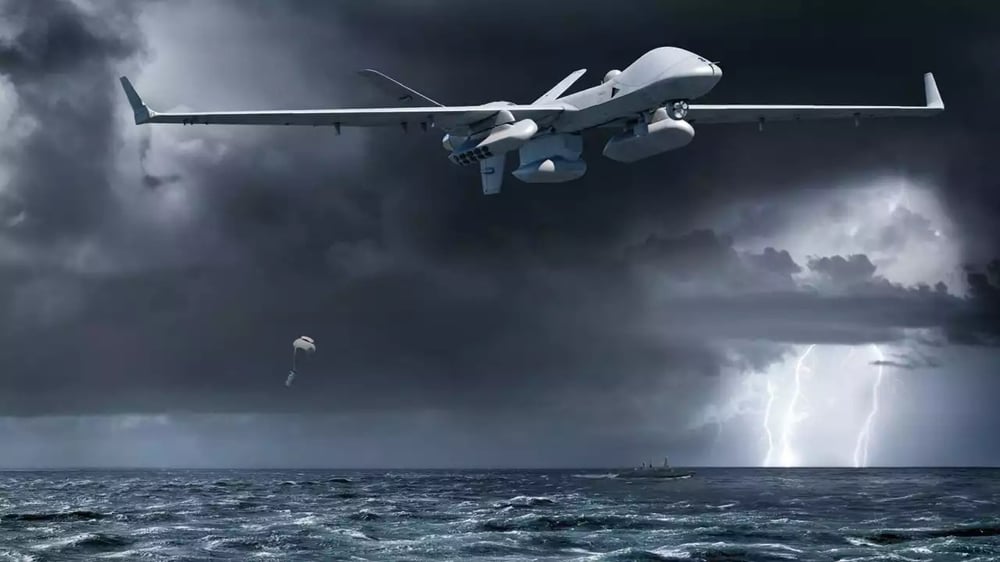 Représentation d'un MQ-9B SeaGuardian larguant une bouée sonar.