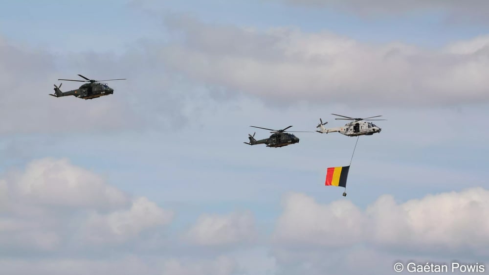 Un NH90 NFH (avec le drapeau belge) et deux NH90 TTH belges lors du défilé du 21 juillet 2019.