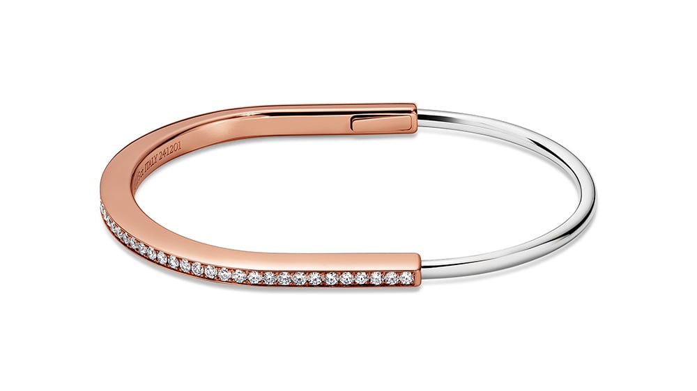 Tiffany & Co. - Bracelet jonc étroit en or rose et blanc 18 carats et pavé de diamants demi-cercle.