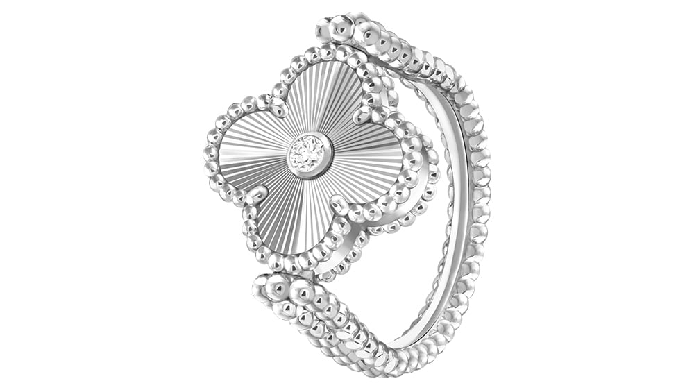 Van Cleef & Arpels - Bague Vintage Alhambra réversible en or blanc, calcédoine et diamant.