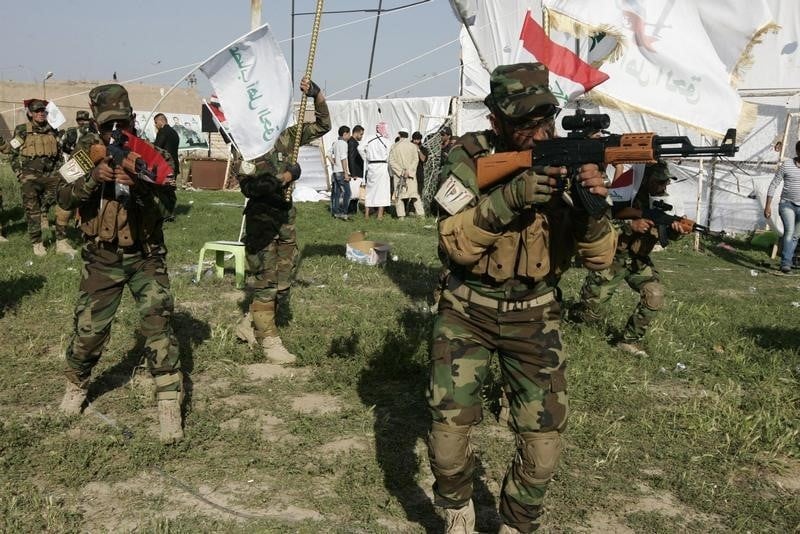 Des milices chiites impliquées en Syrie reviennent en Irak
