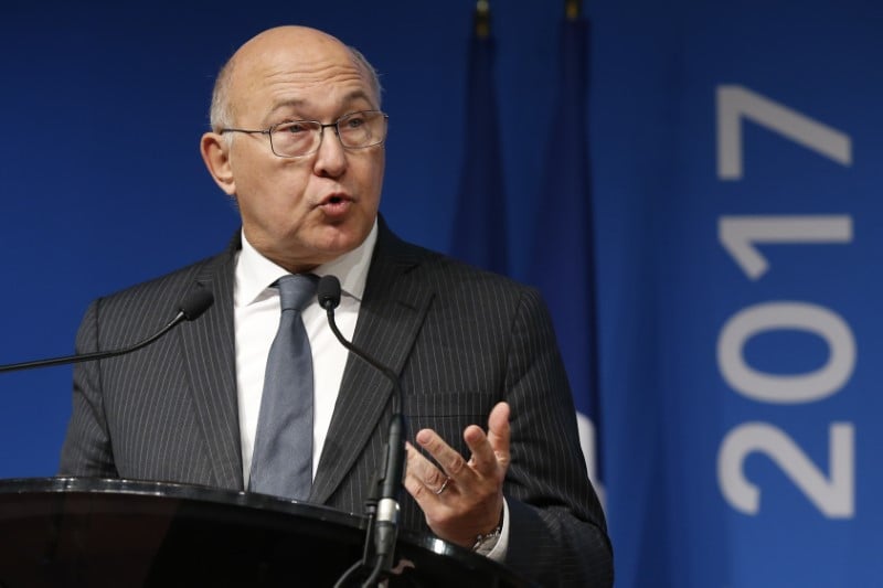 Le deficit public poursuit sa lente decrue