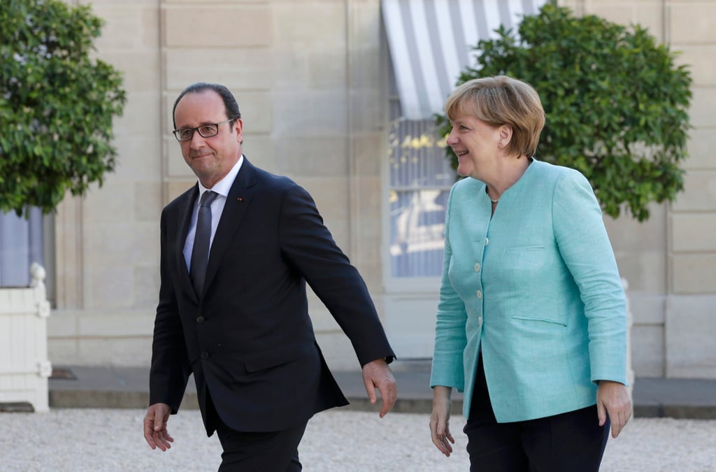 Hollande et merkel appellent tsipras a la responsabilite