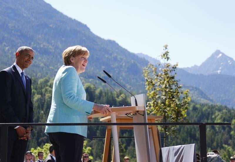 U.s. president obama and german chancellor merkel make speeches after signing the guest book in kruen