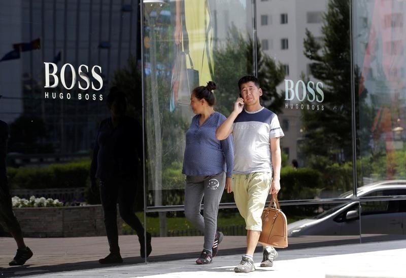 Hugo boss va fermer une vingtaine de boutiques