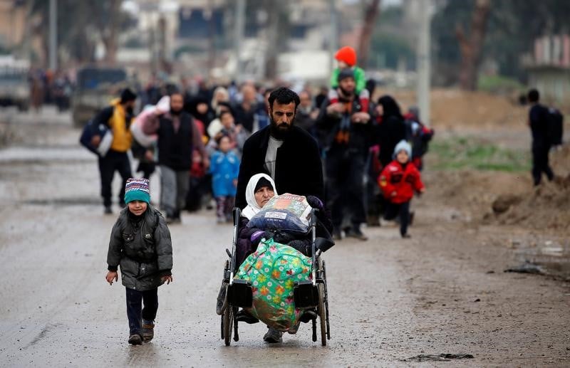 A mossoul, les civils pris entre deux feux