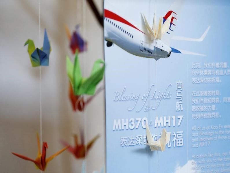 Des fils de passager du MH370 portent plainte contre la Malaysia
