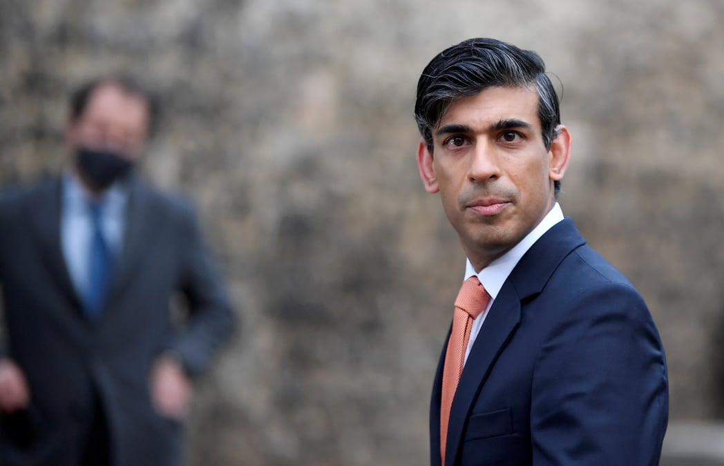 File photo: britain's chancellor of the exchequer rishi sunak looks on as he leaves following an outside broadcast interview, in london