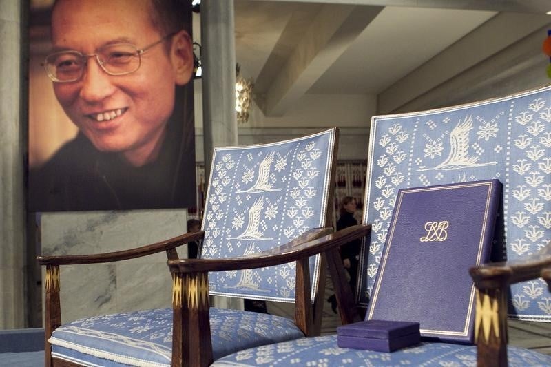 Douze nobel de la paix demandent a cameron de plaider la cause de liu xiaobo
