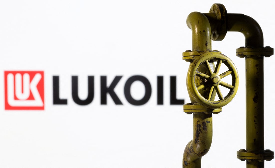 Illustration shows lukoil logo and natural gas pipeline
