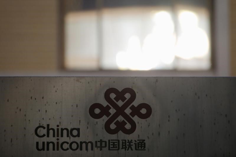 China unicom poursuit ses discussions avec des groupes prives