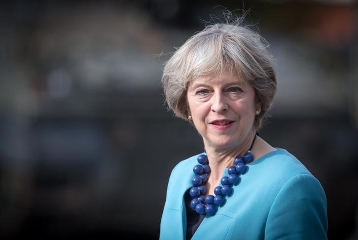 May annonce que londres enclenchera la procedure de sortie de l'ue avant mai 2017