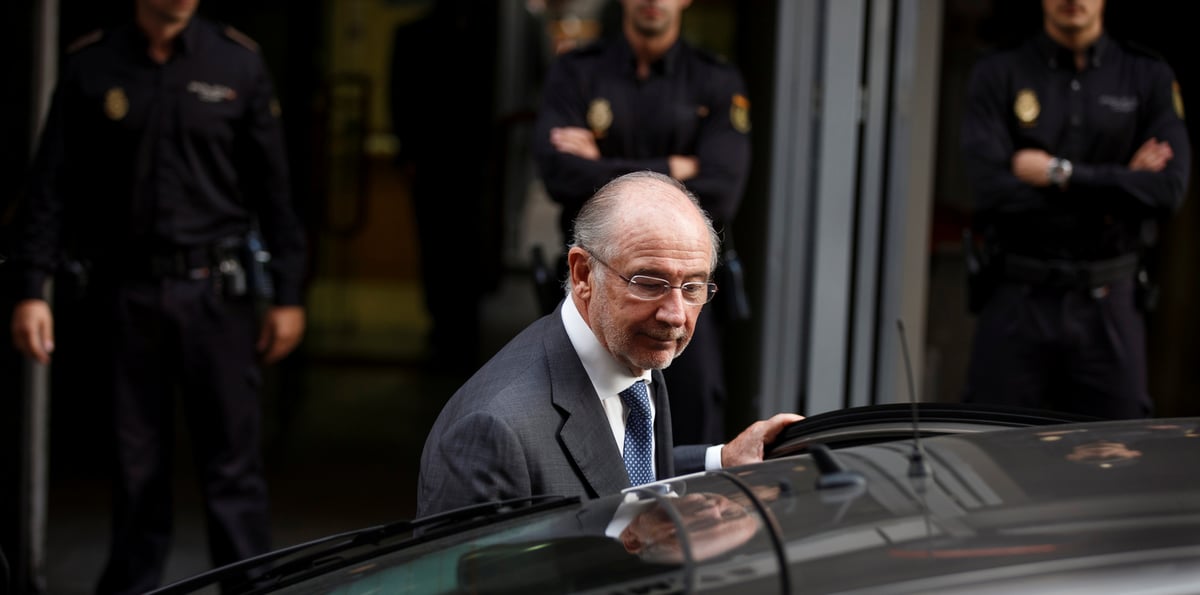 Rato leaves the high court after being questioned by a judge investigating the alleged use of caja madrid credit cards for personal expenses in madrid