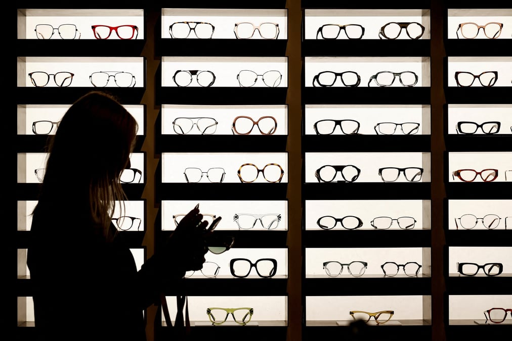 Des lunettes fabriquees par essilorluxottica sont presentees dans leur espace d'exposition au silmo a villepinte, pres de paris
