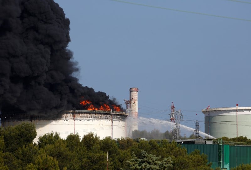 Smoke billows into the sky from one of two fires that started overnight on a petrochemical facility owned by american firm lyondellbasell at the refineries around the etang de berre