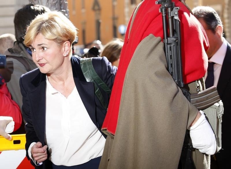 Italy's minister of economic development guidi arrives for a confidence vote at the senate in rome