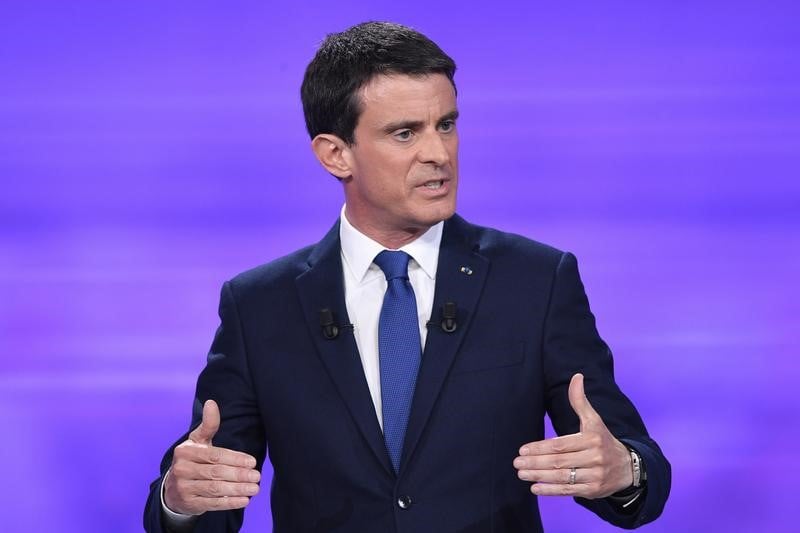 Manuel valls a l'assemblee, malgre une victoire contestee