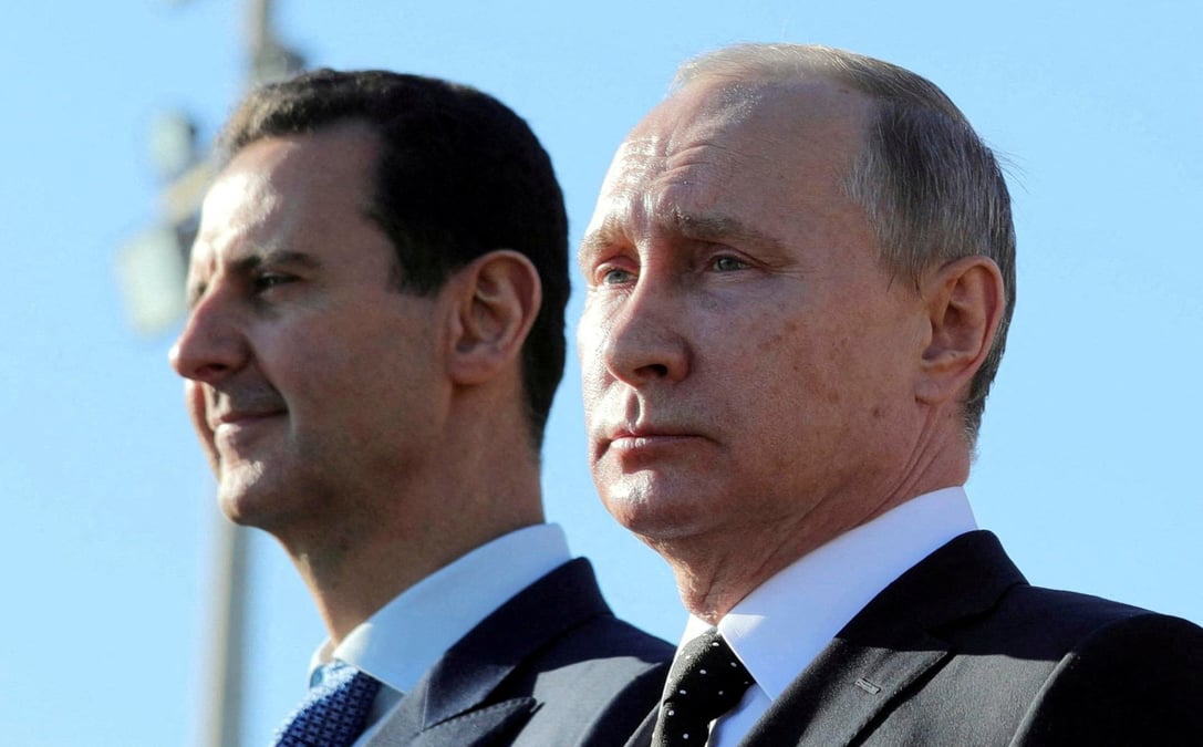 Le president russe vladimir poutine et l'ancien president syrien bachar al-assad