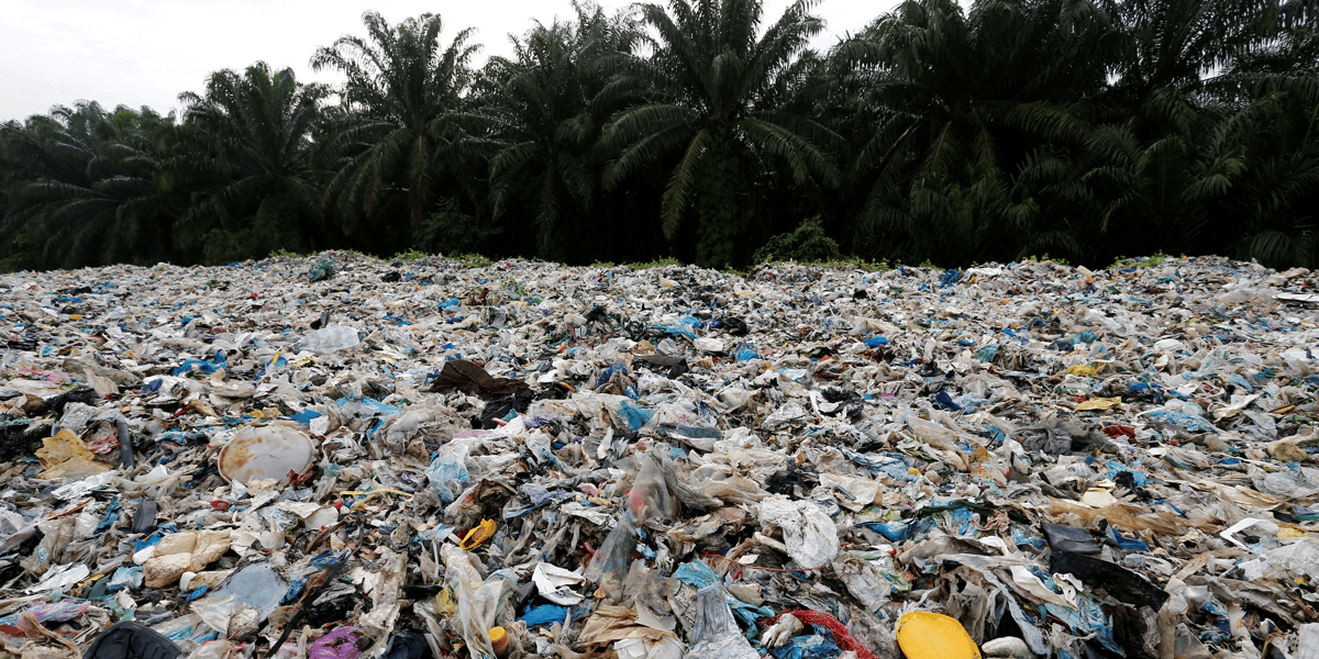 File photo: plastic waste is piled outside an illegal recycling factory in jenjarom, kuala langat