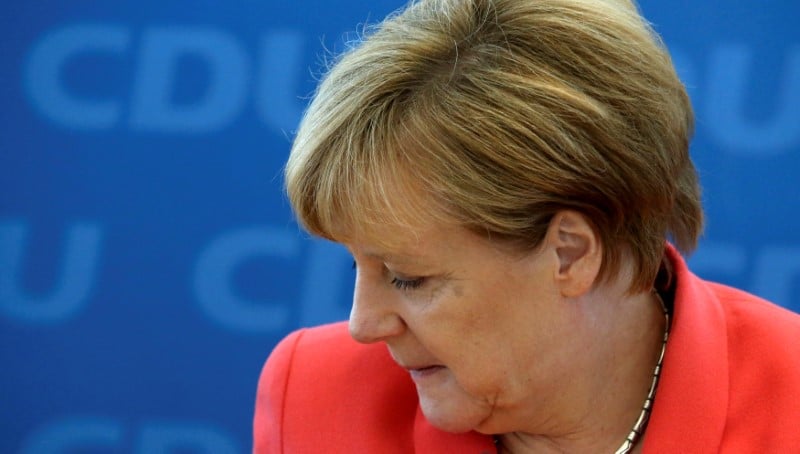 Angela merkel assume sa part de responsabilite dans l'echec des regionales