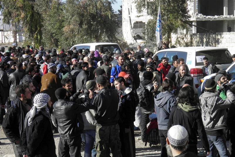 Parmi les évacués de Homs, l'espoir et la crainte
