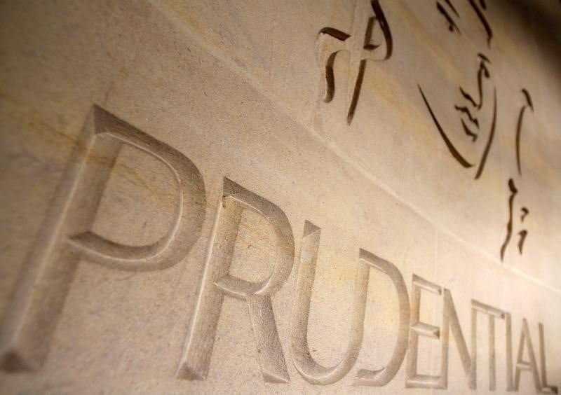 Prudential fusionne gestion d'actifs et assurance au royaume-uni