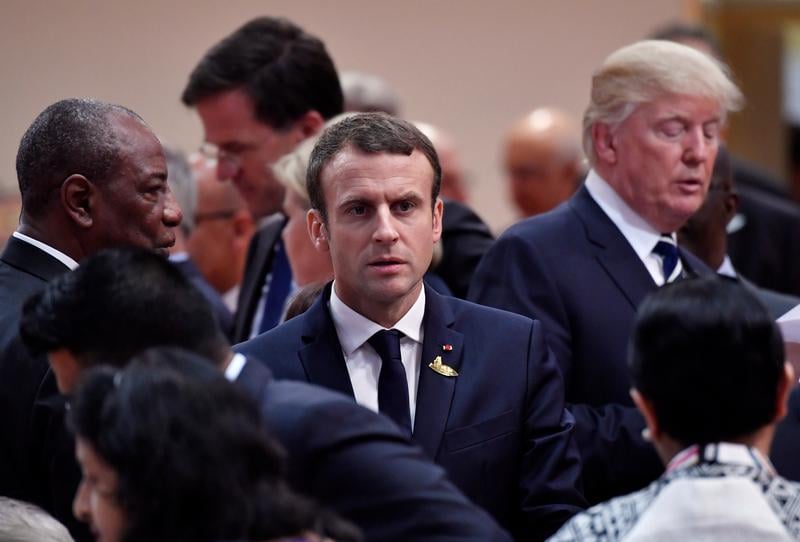 Alpha Condé, Emmanuel Macron et Donald Trump, lors du 12e Sommet du G20, le 8 juillet 2017 à Hambourg en Allemgane.