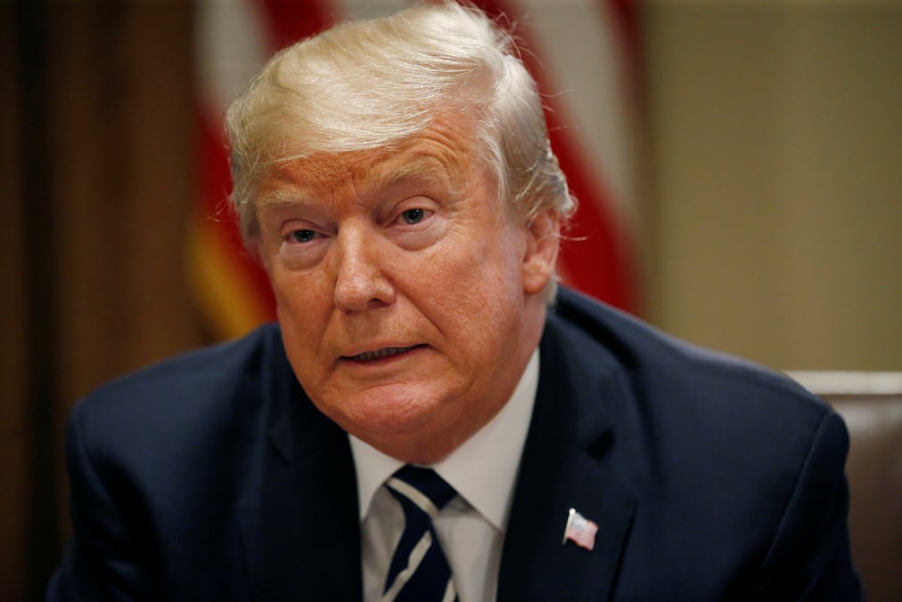 Trump dit s'etre mal exprime a helsinki, revient sur ses propos