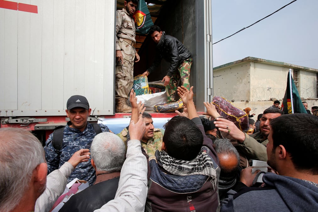 Des convois d'aides chiites arrivent a mossoul
