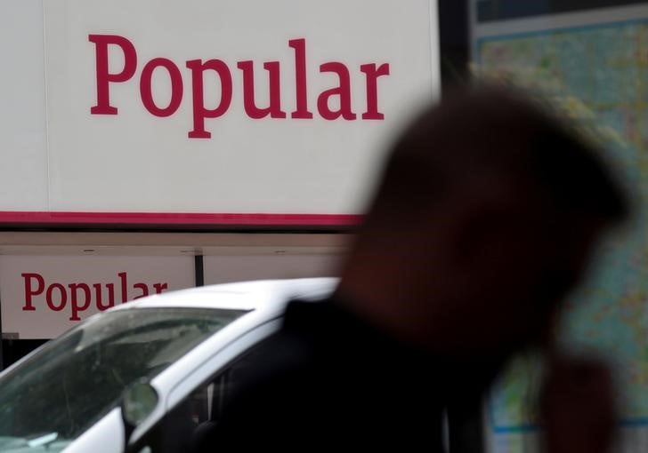 Banco popular cherche a rassurer actionnaires et clients