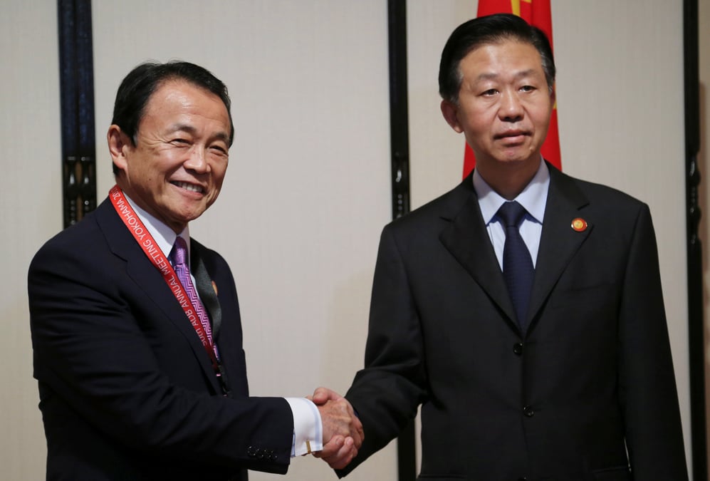 Tokyo et pekin s'emploient a relancer leurs relations financieres