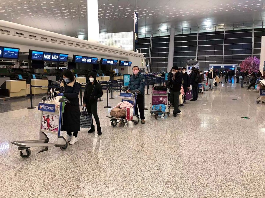 coronavirus, avion-cargo, passagers, rapatriement, ressortissants américains, aéroport, Wuhan, Chine,