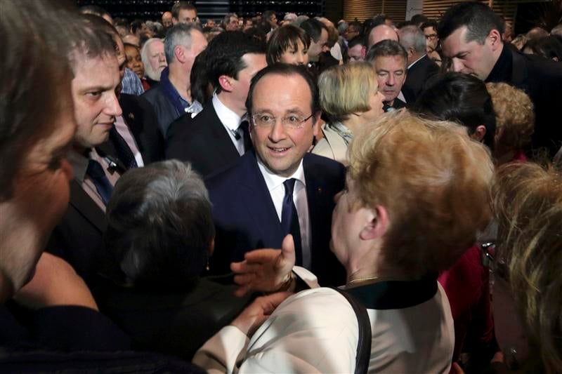 Pause corrézienne pour Hollande, muet sur ses tourments privés