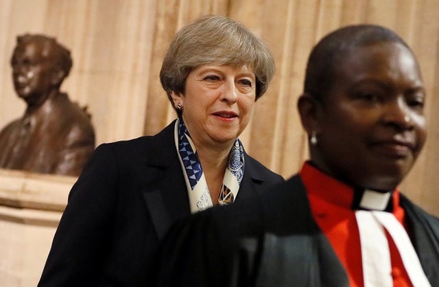 May va offrir des garanties pour les europeens outre-manche
