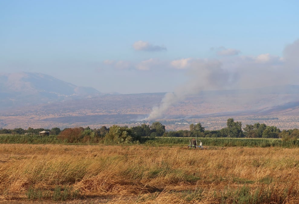 Smoke rises after rockets were fired from lebanon, amid cross-border hostilities between hezbollah and israel, in the israeli-occupied golan heights