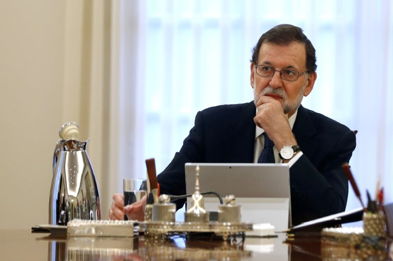 Catalogne: rajoy reclame une clarification, evoque l'article 155