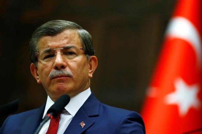 Turkey's prime minister ahmet davutoglu addresses members of parliament from his ruling ak party at the turkish parliament in ankara