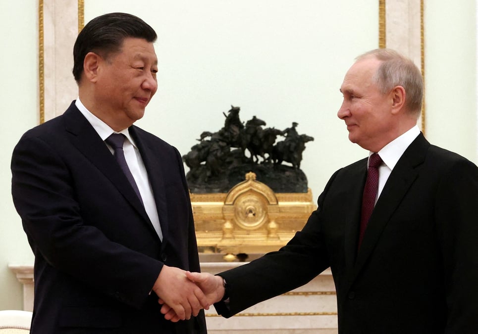 Vladimir poutine s'entretient avec son homologue chinois xi jinping