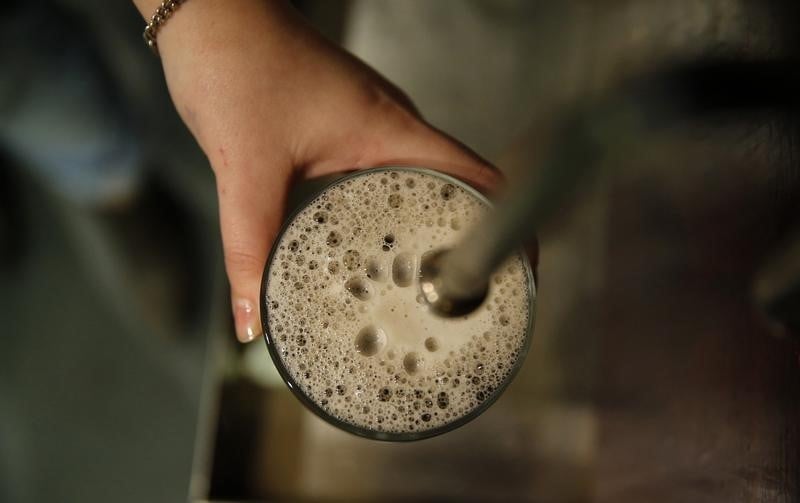 Anheuser-bushc inbev ameliore son offre sur sabmiller