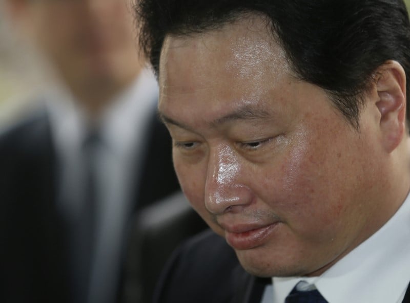 Le patron de sk group interroge par la justice sud-coreenne