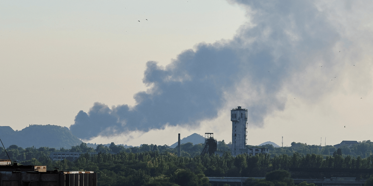 Smoke rises after shelling during ukraine-russia conflict in donetsk