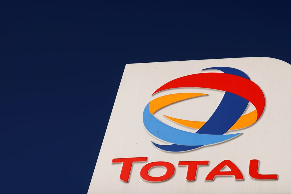 Total: net ajuste en baisse de 72% au troisieme trimestre, dividende maintenu