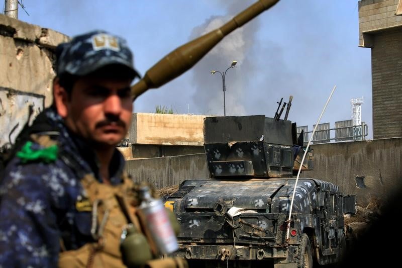 Les forces irakiennes reprennent un deuxieme pont a mossoul