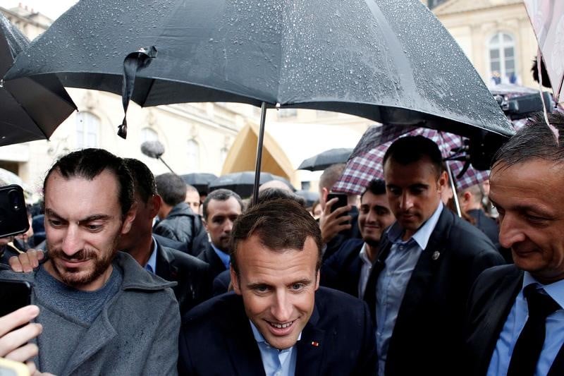 Climat: macron ne "cedera rien" aux equilibres de l'accord de paris