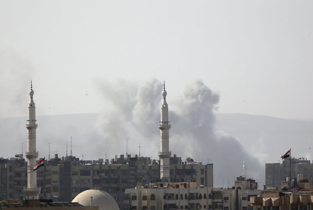 Des rebelles de yarmouk se rendent aux autorites syriennes