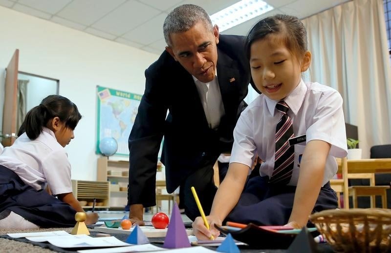 Visite de barack obama dans un centre pour refugies en malaisie