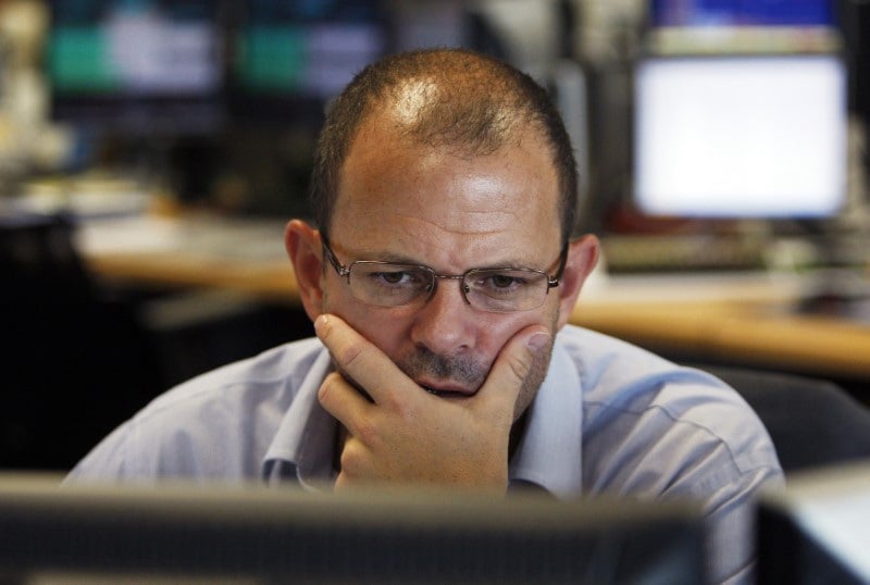 Un trader travaille chez cmc markets a londres