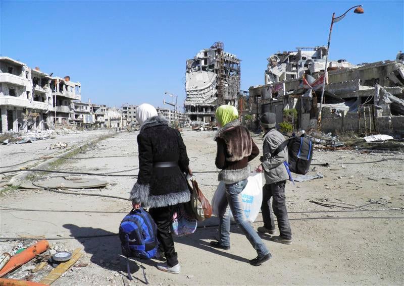 Tirs de mortier à Homs avant l'entrée d'un convoi de l'Onu